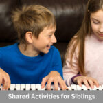 siblings playing piano