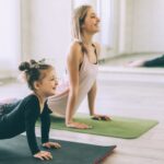 girl and child doing exercises