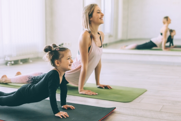 girl and child doing exercises